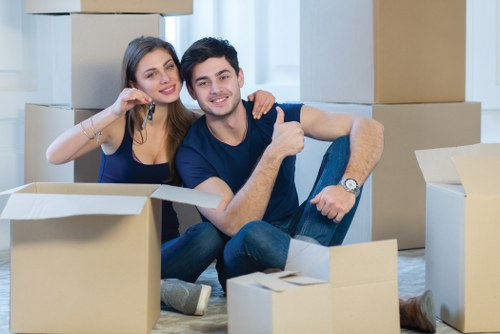 Local moving team handling boxes and furniture in Eastcote
