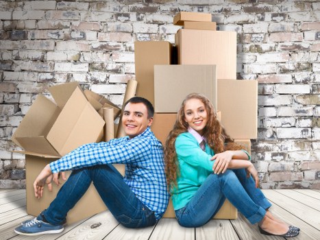 Packed moving boxes and furniture ready for local removals in Eastcote