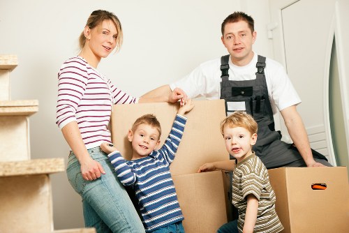 Careful loading of office items for transport in Eastcote