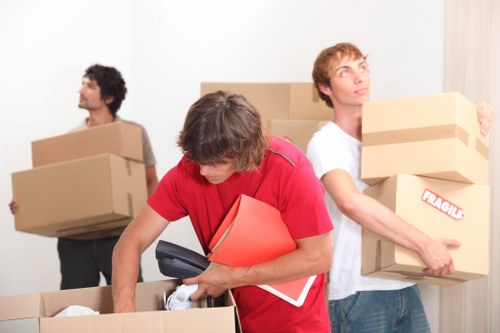 Removalists loading items for an Eastcote property move
