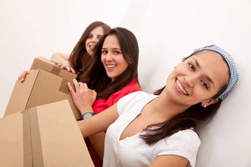 Family home moving preparation in Eastcote with labelled boxes and furniture