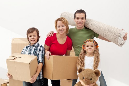 Office relocation equipment and boxes prepared for transport in Eastcote