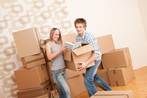 Packed office boxes and labeled items for a commercial move